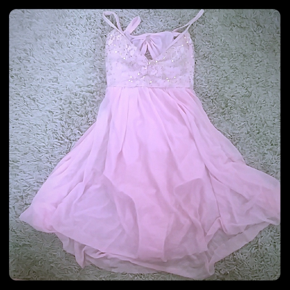 Contemporary pink dress with open back